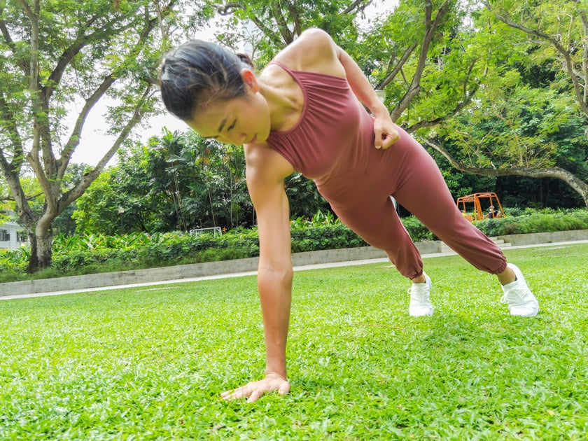 fit woman one hand push up 